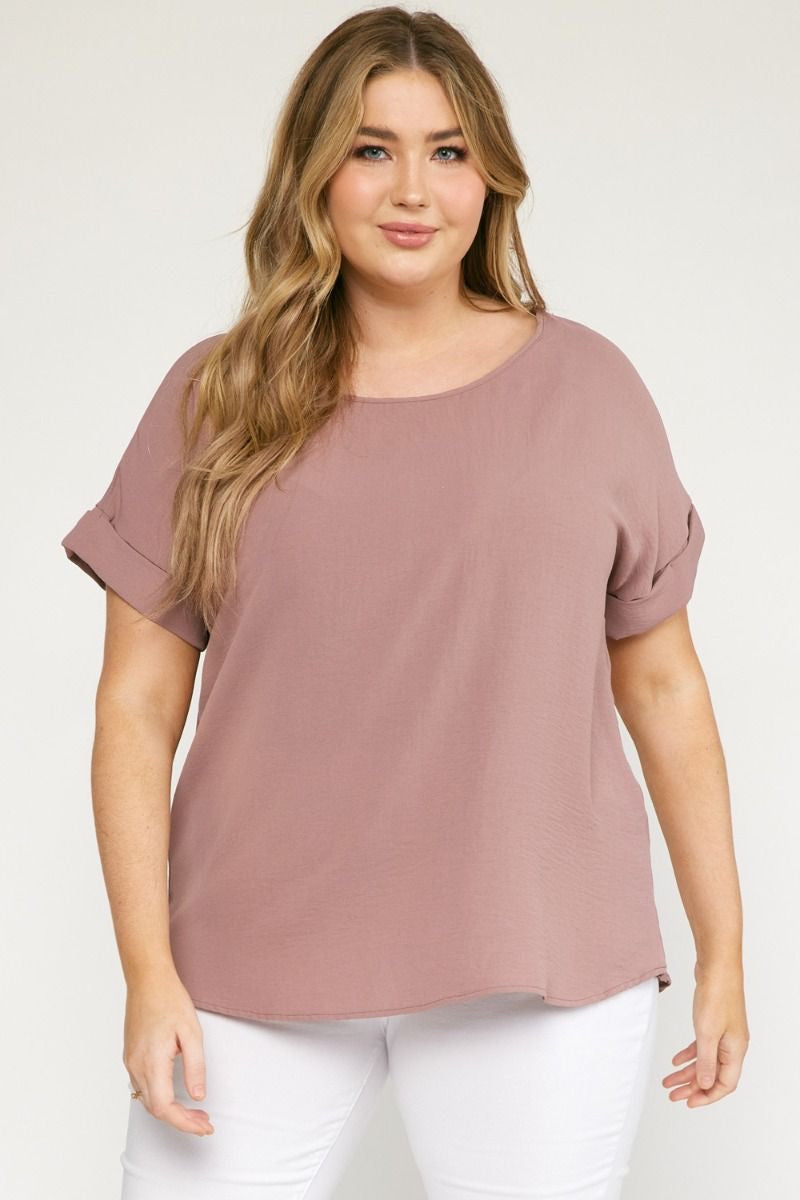 Mocha scoop-neck top featuring permanent rolled sleeve detail and an asymmetrical hem.