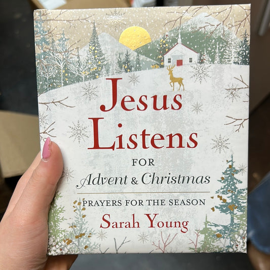 Book with a winter scene with a church featuring "Jesus Listens for Advent & Christmas; Prayers For The Season; Sarah Young".