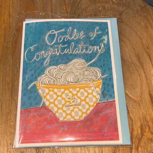 Card with a bowl of noodles displaying “Oodles of Congratulations!” 