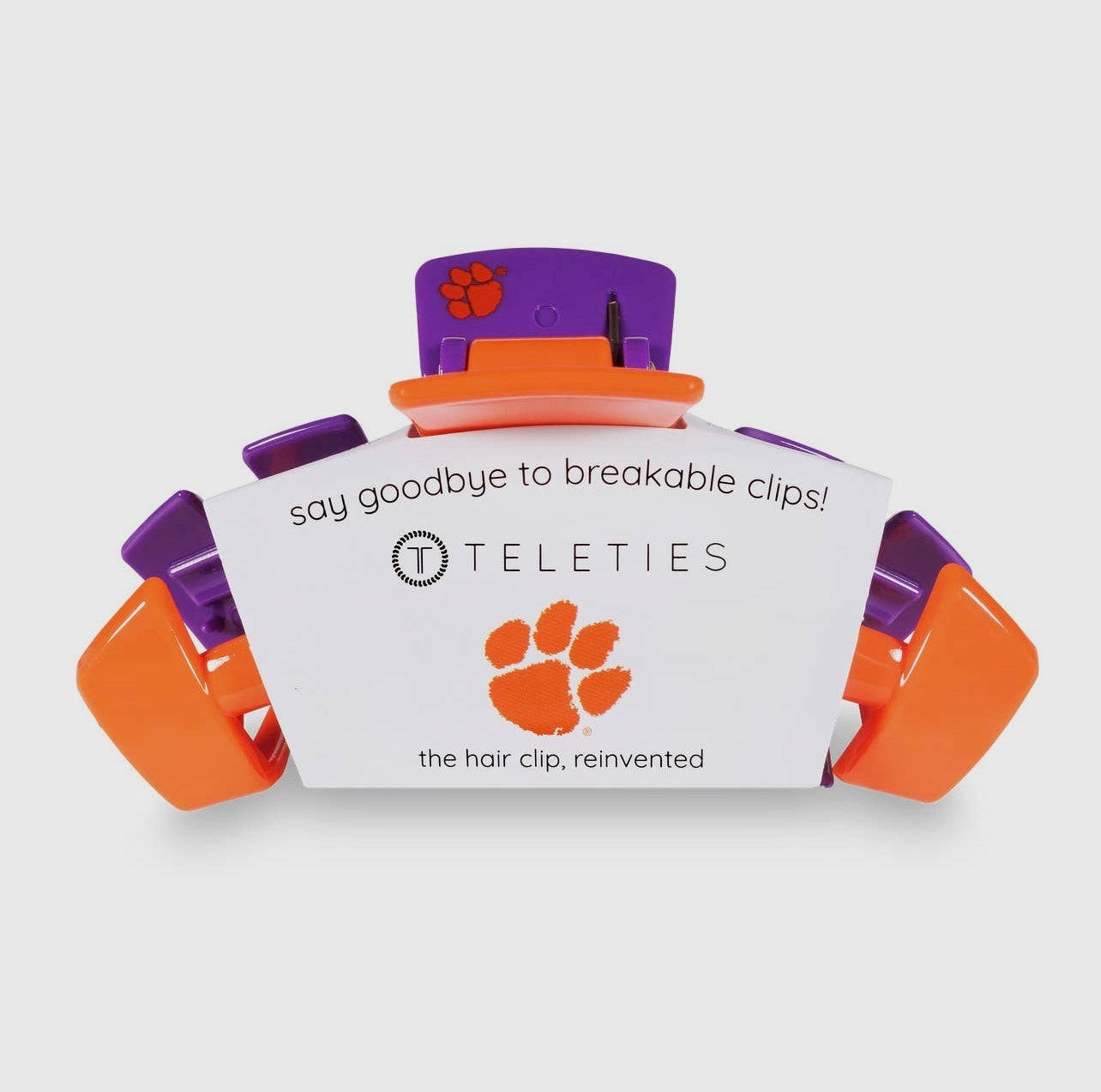 Clemson University Collegiate Teletie Claw Clip in orange and purple. Side view with packaging.