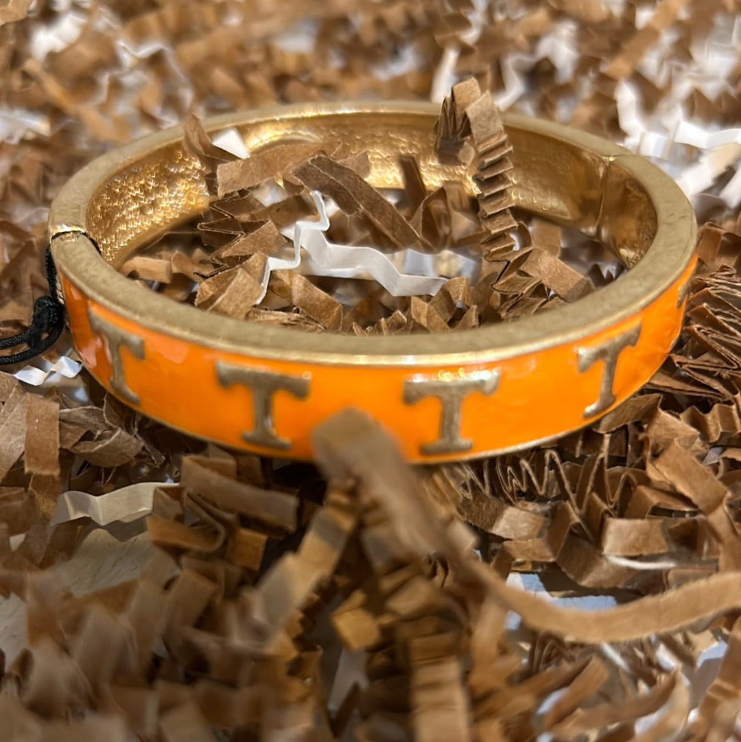 Gold and orange College Enamel Hinge Bangle with "T".