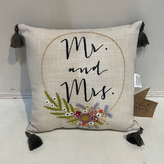 Square Canvas Material pillow with a floral stitching displaying “Mr. and Mrs.”