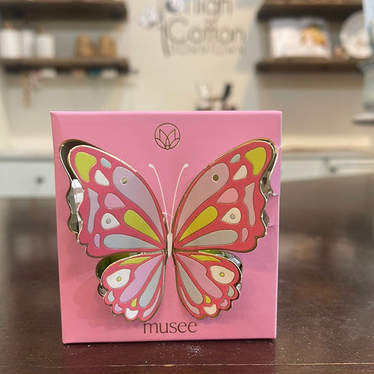 Musee bath balm with butterfly on box.