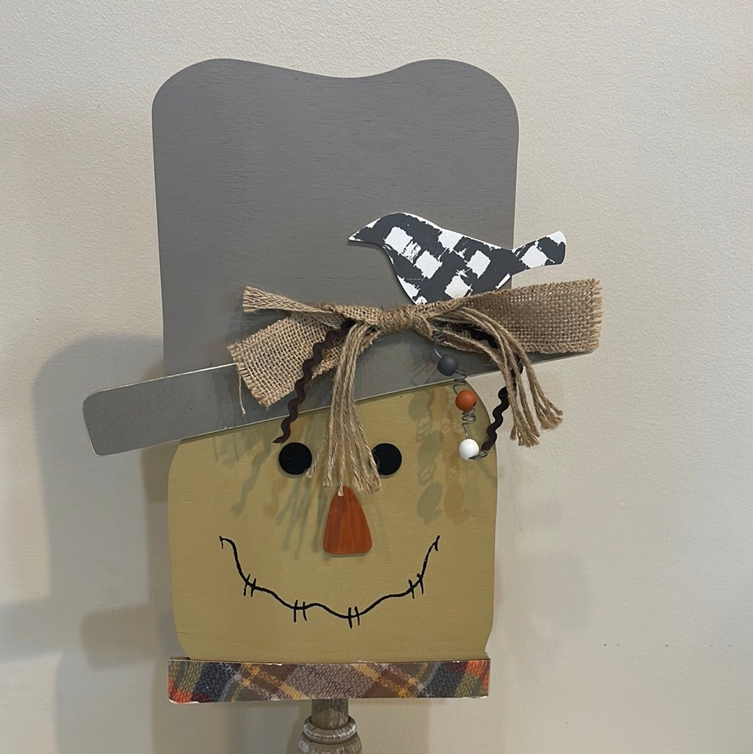 Scarecrow topper for welcome sign.