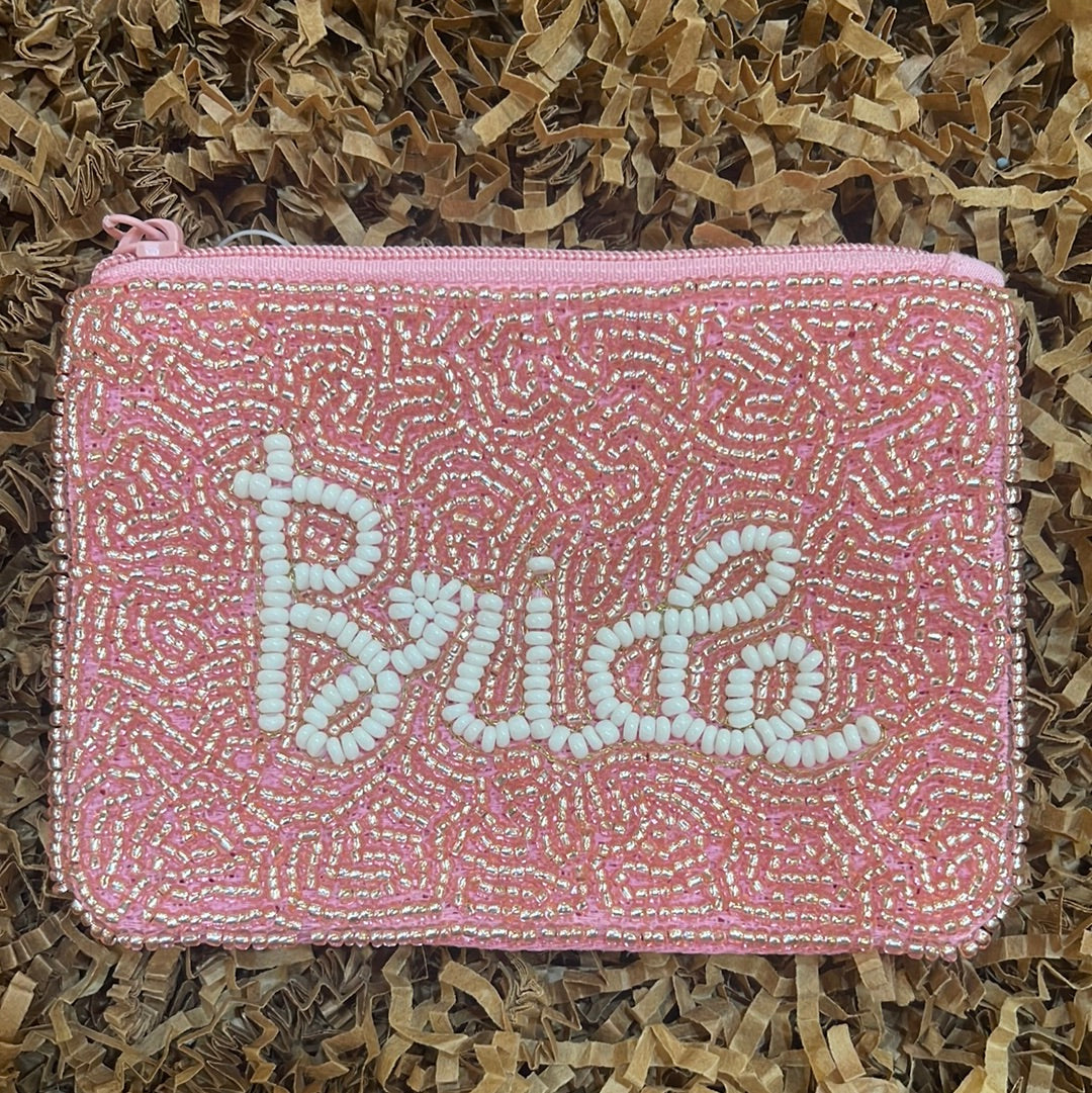 Hand sewn pink beaded coin purse featuring "Bride".
