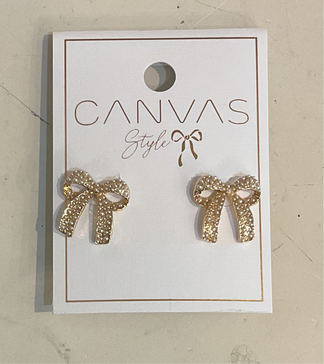 Canvas Priscilla Pearl Studded Bow Earrings in
Shiny Gold