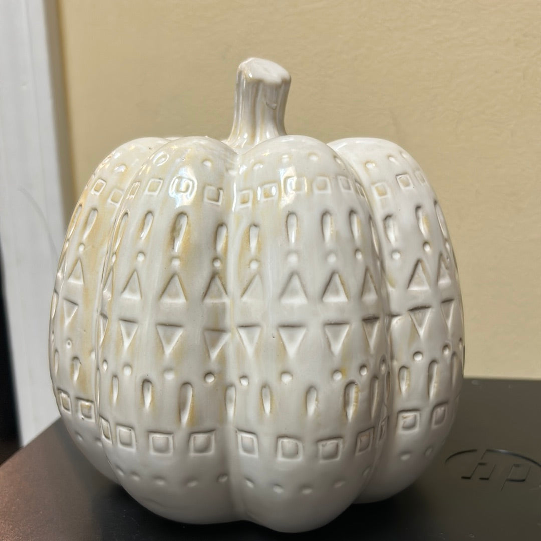 White ceramic decorative pumpkin with boho pattern.