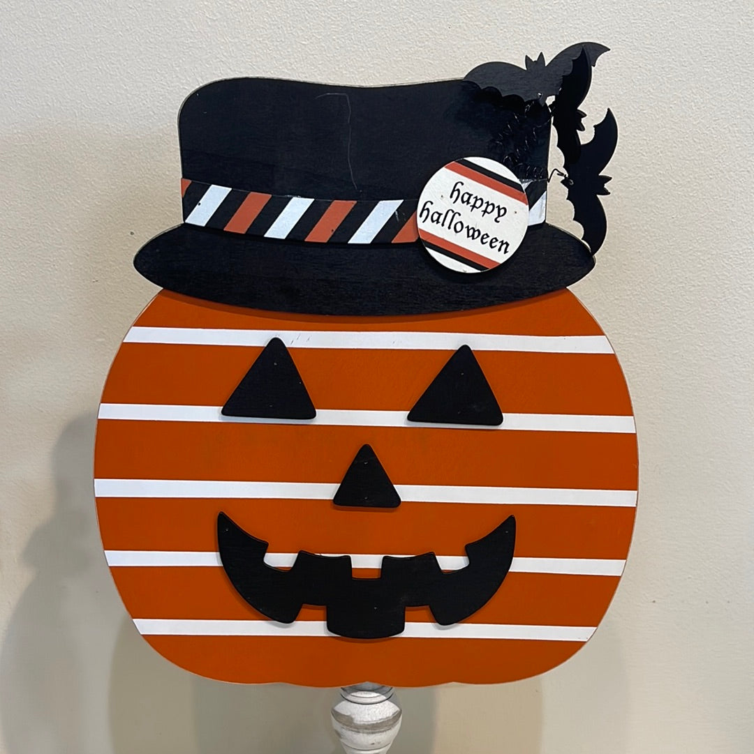 Jack-o-lantern topper for welcome sign.