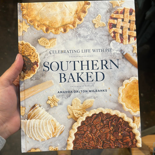 Books with pies titling "Southern Baked".