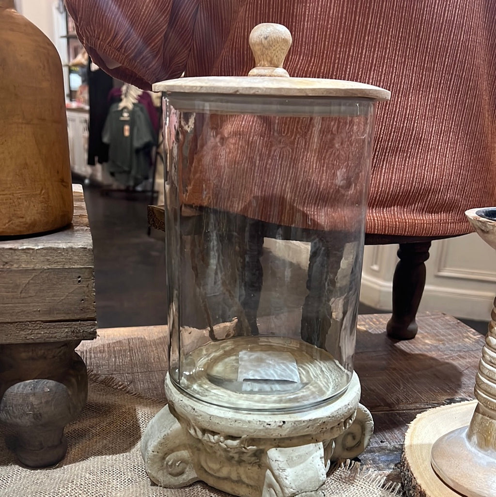 Clear glass canister with wooden lid.