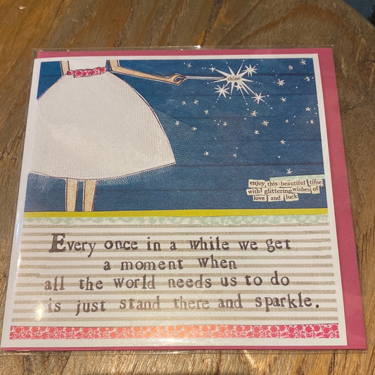 Card with a girl with a sparkler displaying “Every once in a while we get a moment when all the world need us to do is just stand there and sparkle.”