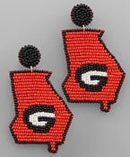 Red and black beaded earrings in the shape of Georgia featuring a "G".