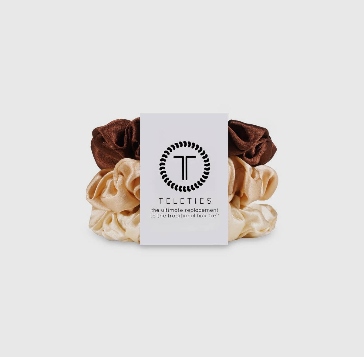 Neutral teletie silk scrunchies.