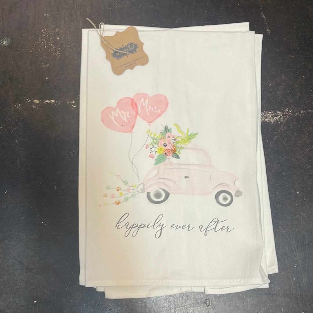 "Happily ever after" newlywed decorative dish towel featuring a car with flowers and balloon hearts with " Mr." & "Mrs."