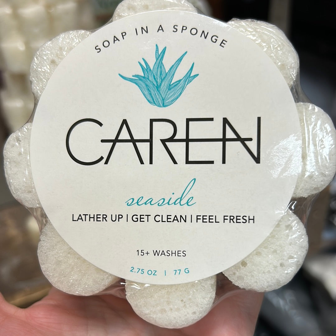Caren "Seaside" soap sponge shaped like a white flower.