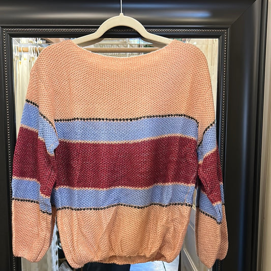 Color block pullover sweater with pink, blue and red colors.