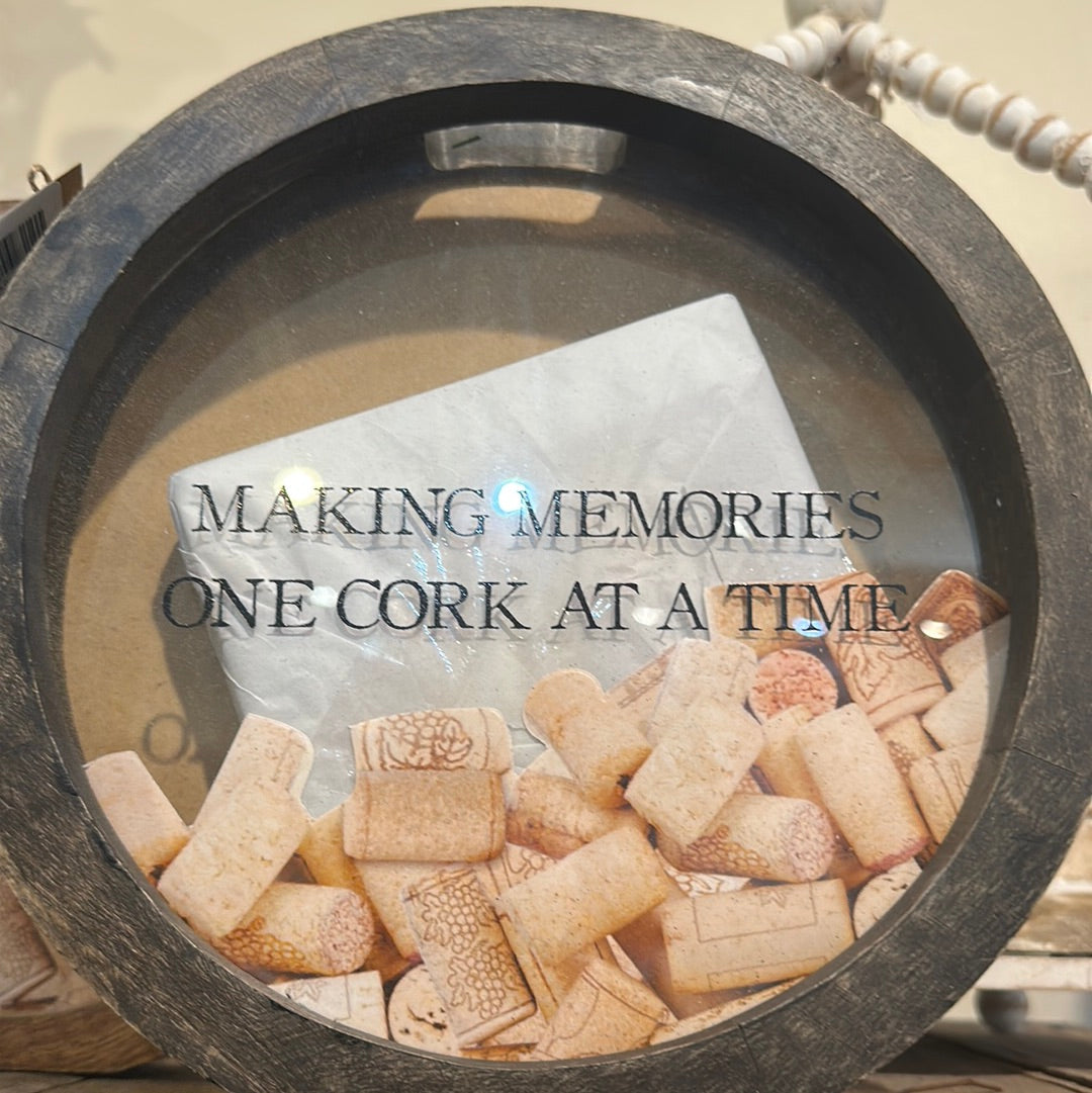 Black cork saver featuring "Making memories one cork at a time".