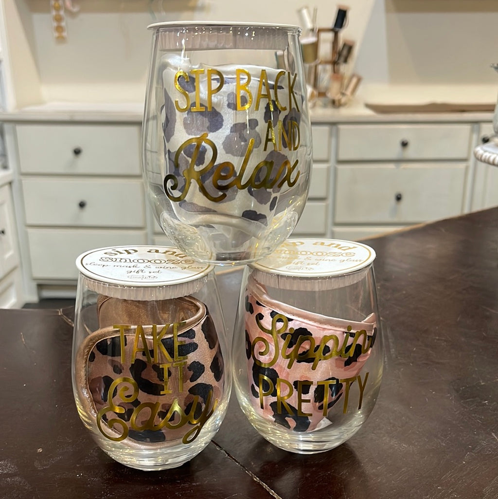 Assorted sip & snooze wine glass & sleep mask set.
