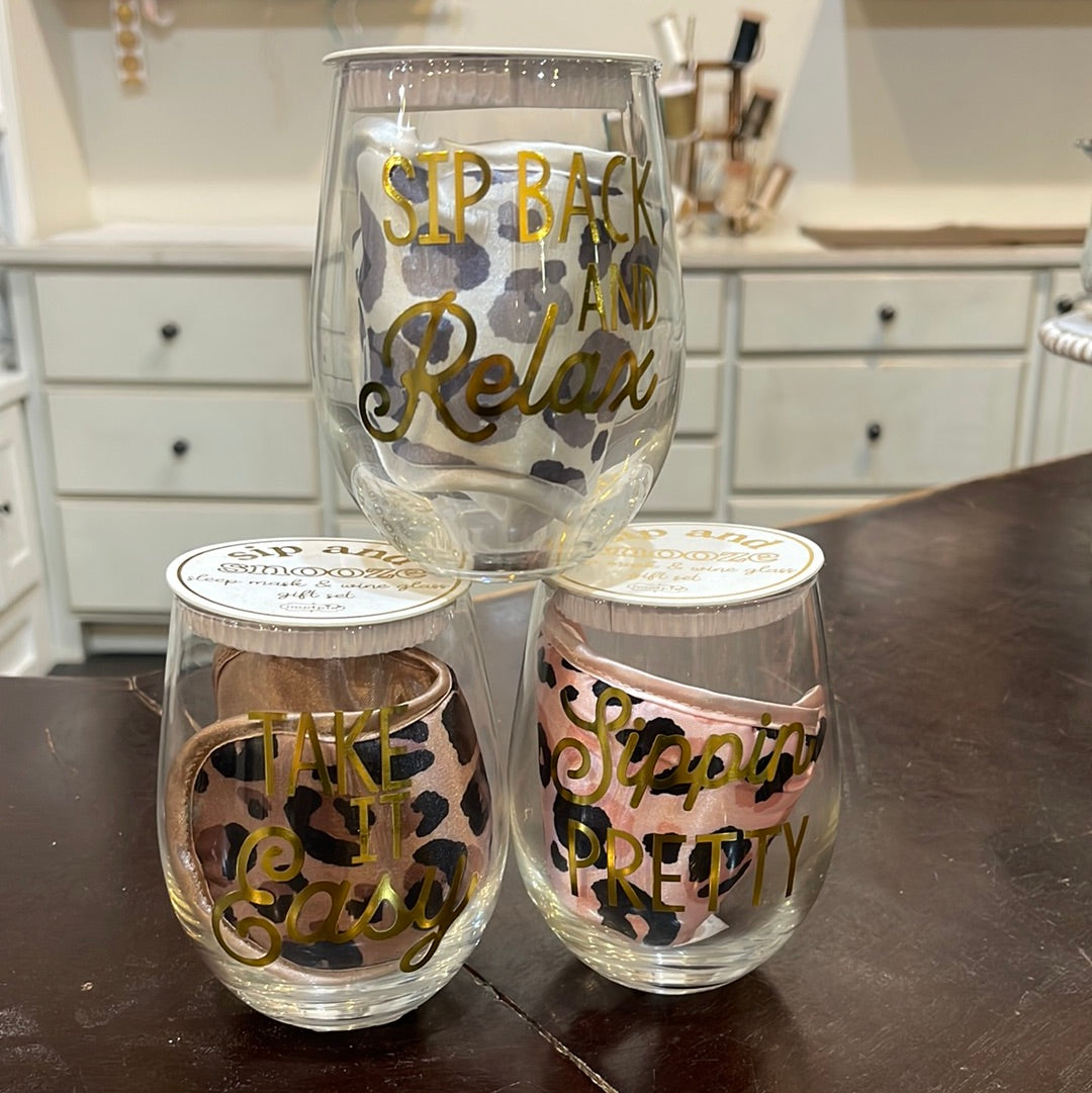 Assorted sip & snooze wine glass & sleep mask set.