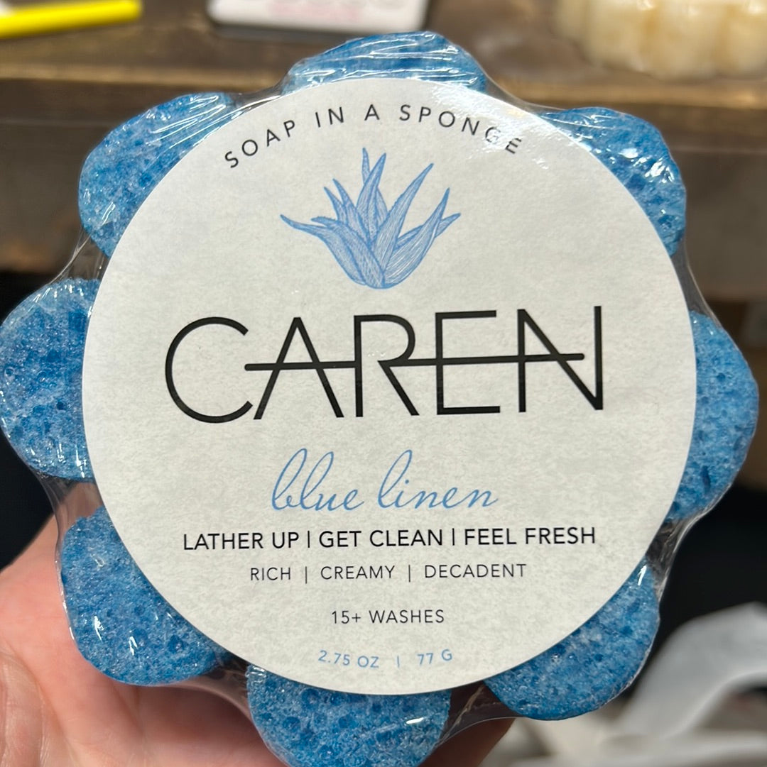 Caren "Blue Linen" soap sponge shaped like a blue flower.