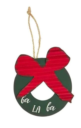 Wreath with red bow and "Fa La La" tin Christmas ornament.