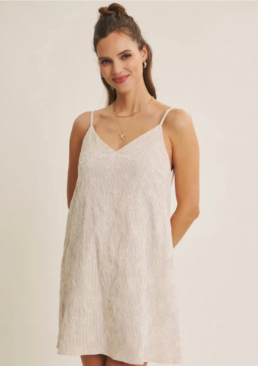 Quietly Detailed Embroidery On Textured
Stripe Shift Mini