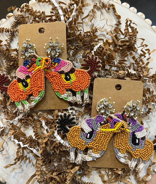 Assorted multicolored race horse earrings.
