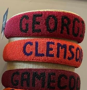 Assorted College beaded headbands.