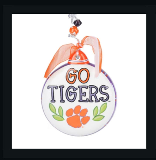 Christmas ornament featuring "Go Tigers" in orange and purple lettering, with a Clemson paw.
