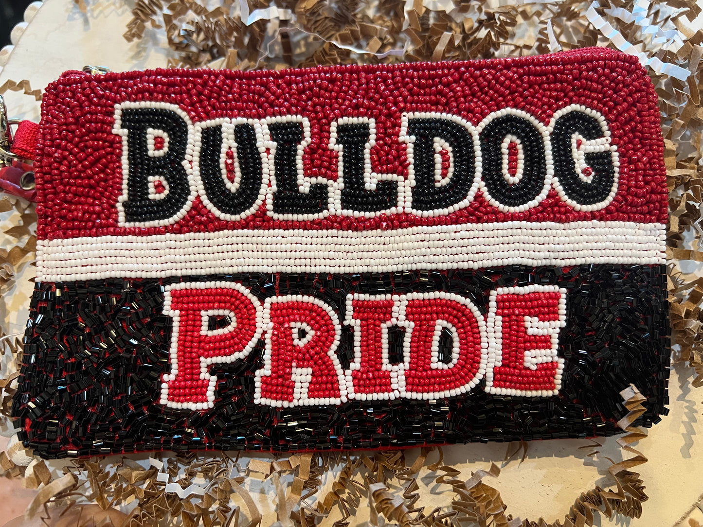 Beaded Georgia Bulldog coin purse featuring "Bulldog Pride" in red, white, and black beaded stripes.