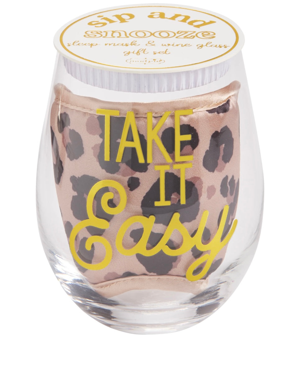 "Take It Easy" sip & snooze wine glass & sleep mask set.
