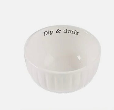 White bowl displaying "Dip & dunk" on the inside rim.