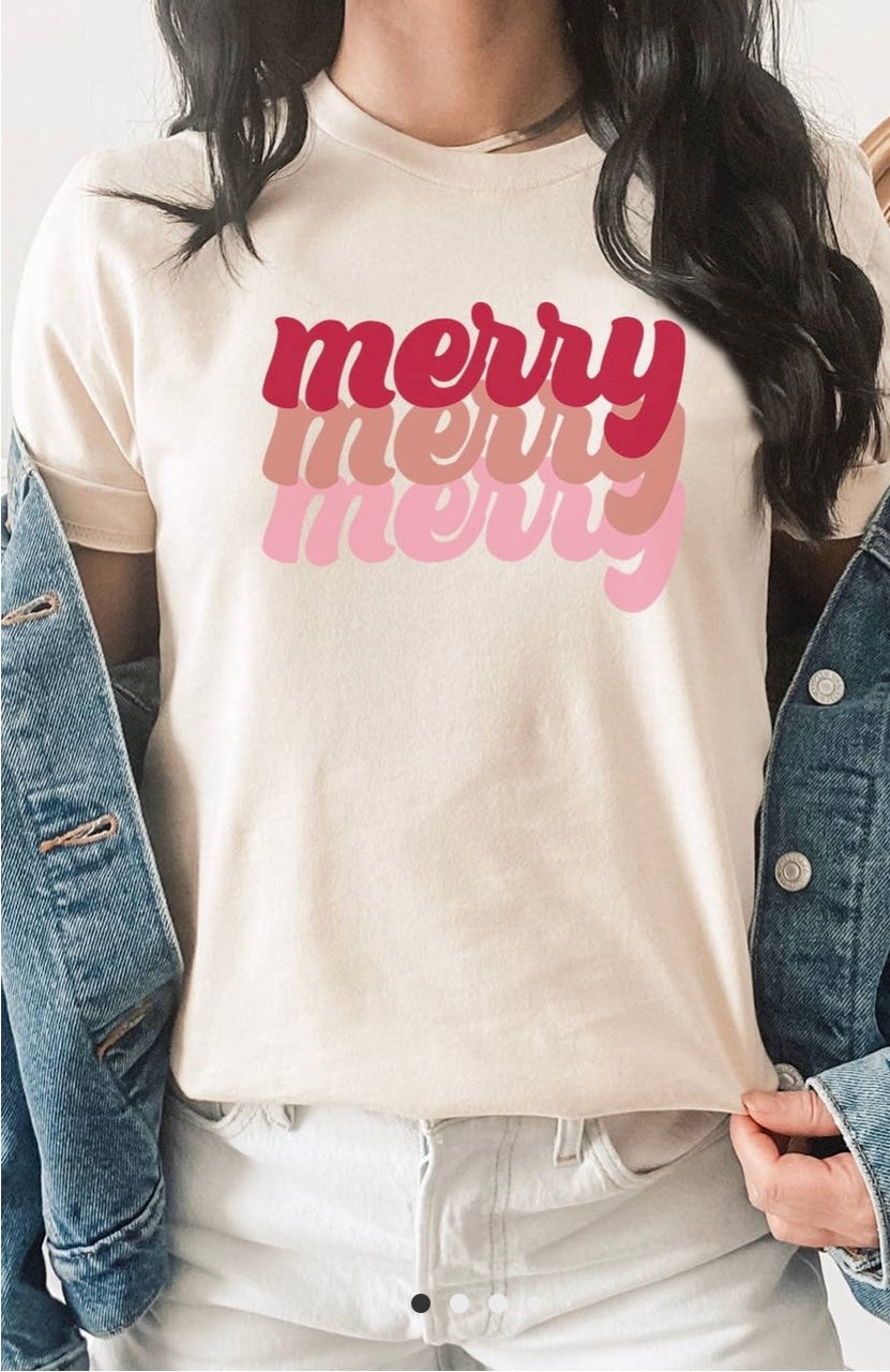 Christmas Graphic T-Shirt featuring "merry" in red, tan and pink.