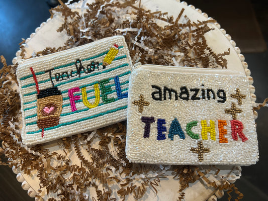 Assorted teacher beaded coin purses.