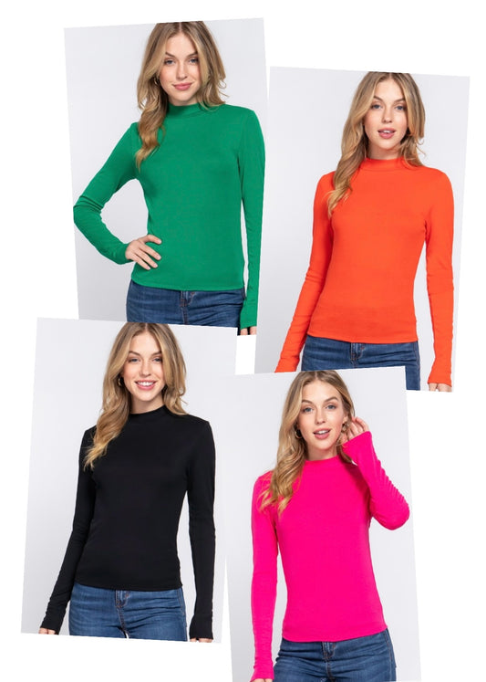 Model featuring basic mock neck tops in assorted colors.