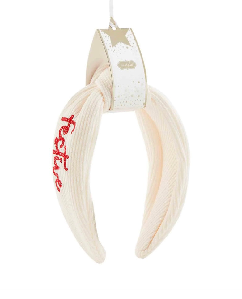 White Christmas Embroidered Topknot Headband with red lettering.