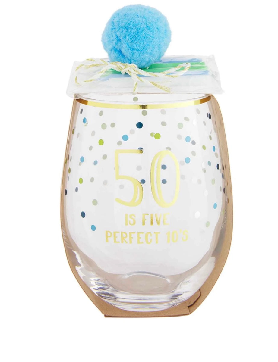 Light blue stemless wine glasses with confetti details that says "50 is five perfect 10's".