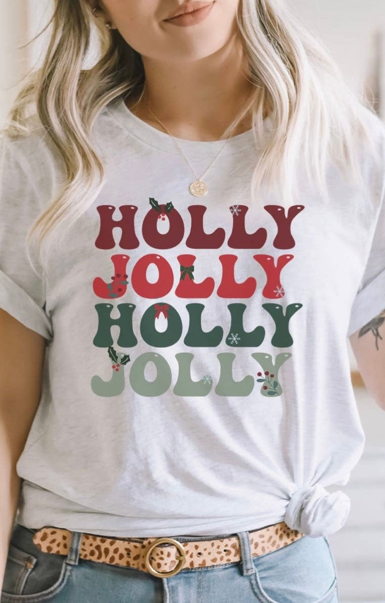 Christmas Graphic T-Shirt featuring "Holly, Jolly, Holly, Jolly" in dark red, bright red, dark green, and light green.