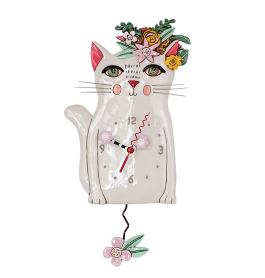 Clock designed as a cat with a floral crown.
