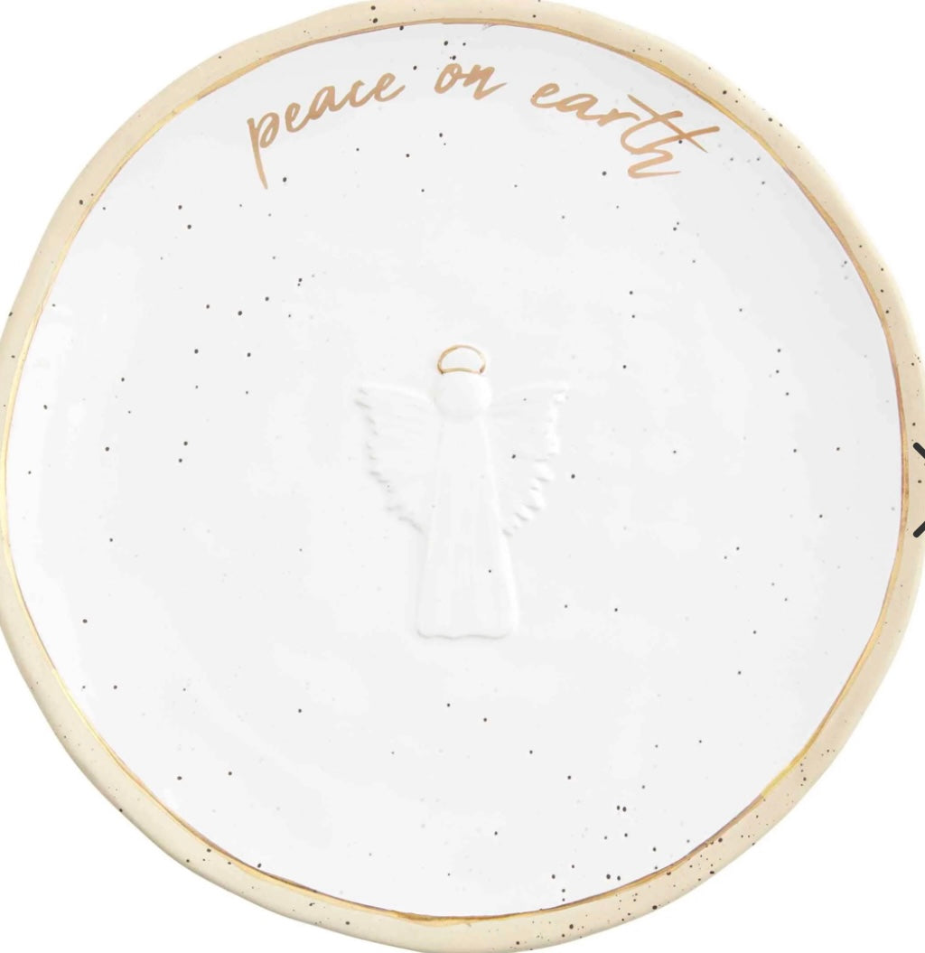 White platter with gold trim featuring an angel and "Peace on Earth".