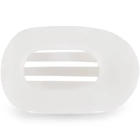 White teleties flat round clip.