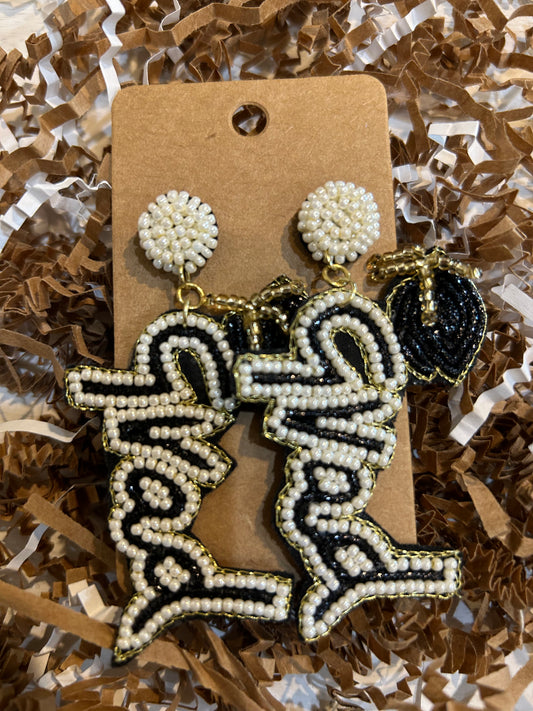 Black, white and gold beaded dangling earrings featuring "GRAD".