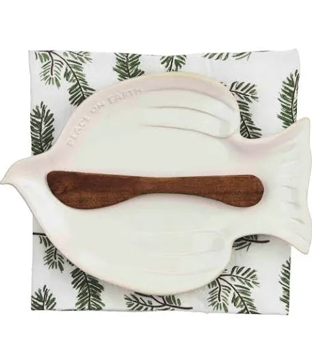 White dove bowl with wooden spreader.