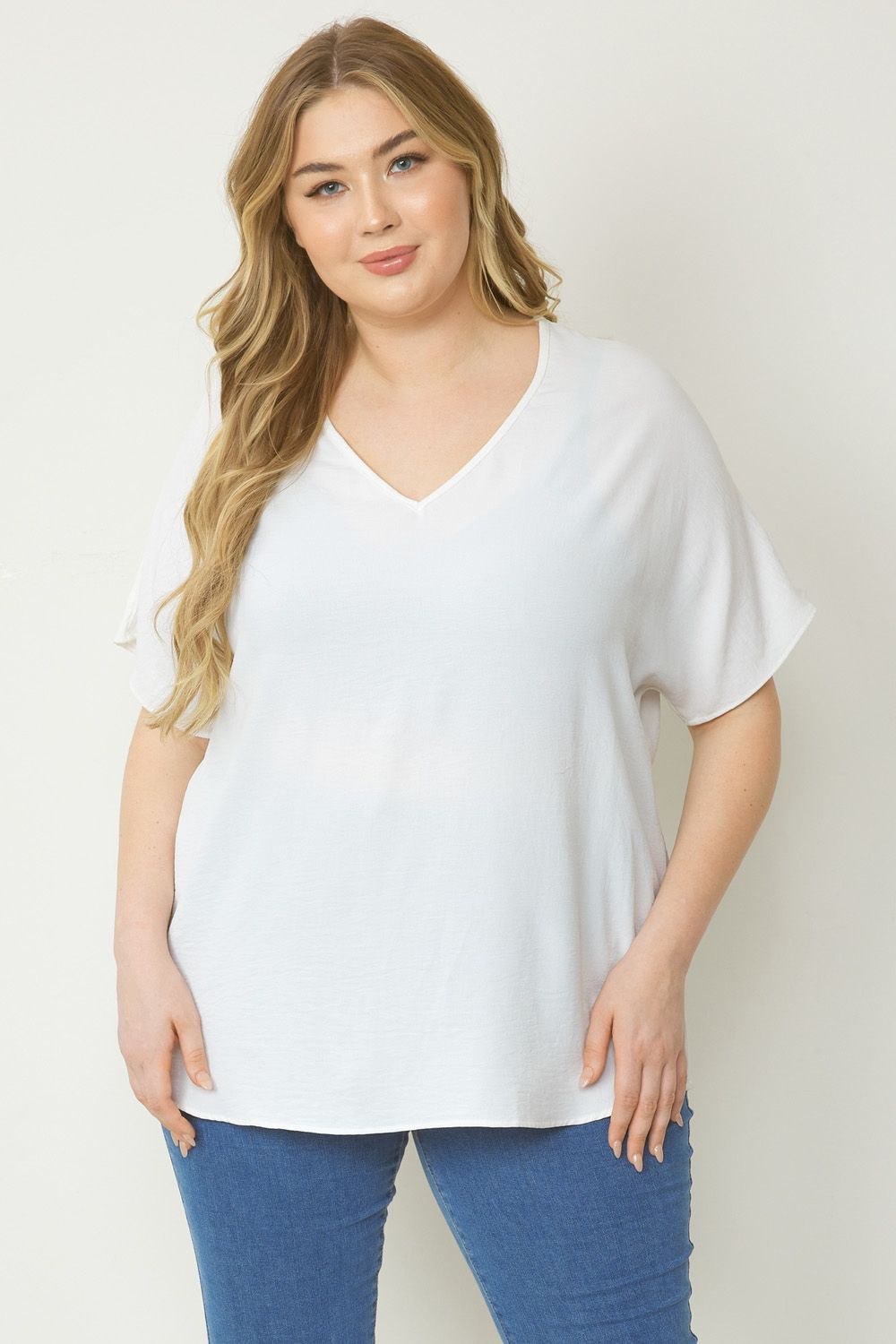 Women's white basic v-neck shirt.