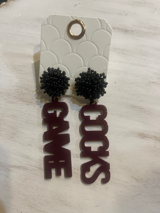 Beaded black stud earring with acrylic garnet "GAME" & "COCKS".