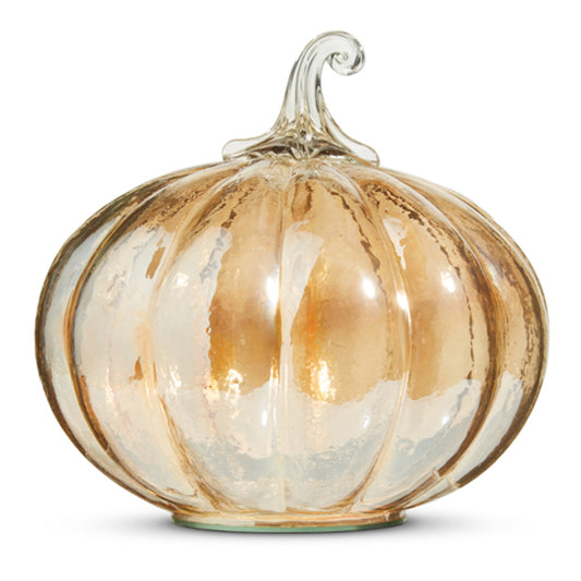 Decorative glass pumpkin with orange hues.
