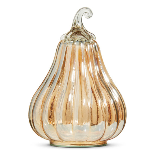Decorative glass pumpkin with orange hues.