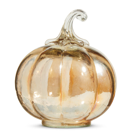 Decorative glass pumpkin with orange hues.