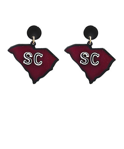 Acrylic South Carolina Earrings with round, black stud. The dangle is the shape of South Carolina featuring "SC". Black and garnet accents.