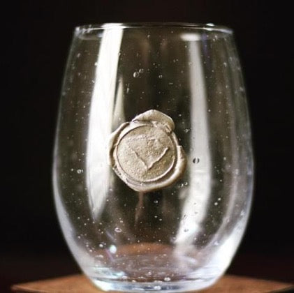 Hand blown drinking glass with custom pewter South Carolina stamp.